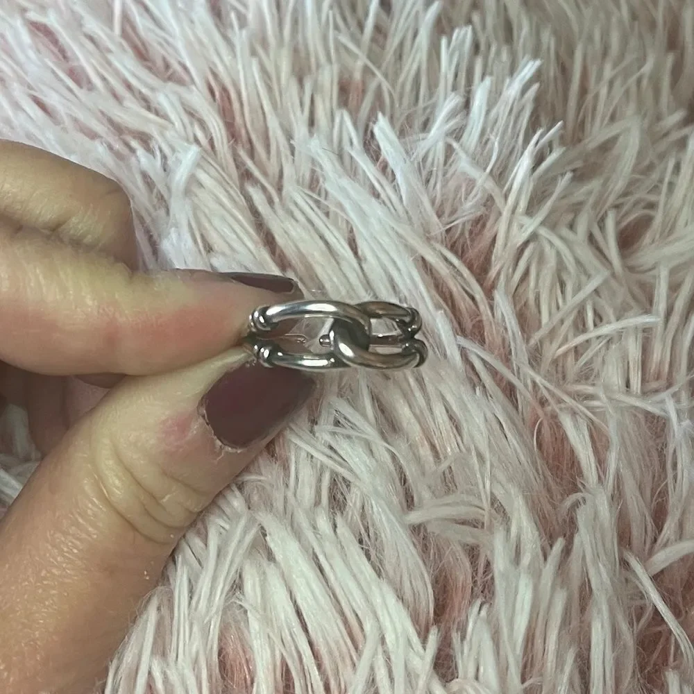 The Tie Me In Knots Ring, adjustable in 925 silver